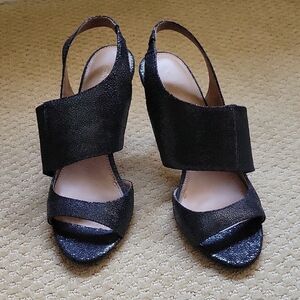 Calvin Klein Black Heels with Modern Slingback Design